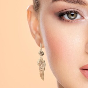 Gift Idea Collection Silver Angel Wing Earring Bohemian Dangle Design Floral Charm Accent Lightweight Statement Piece Wedding Guest Accessory Party Wear Essential Celestial Jewelry Trend Boho Style Fashion Special Occasion Must Have