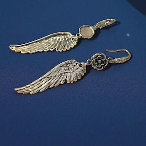 Gift Idea Collection Silver Angel Wing Earring Bohemian Dangle Design Floral Charm Accent Lightweight Statement Piece Wedding Guest Accessory Party Wear Essential Celestial Jewelry Trend Boho Style Fashion Special Occasion Must Have