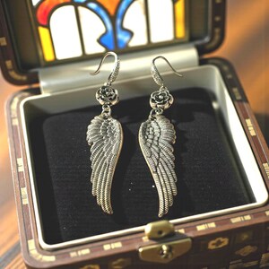 Gift Idea Collection Silver Angel Wing Earring Bohemian Dangle Design Floral Charm Accent Lightweight Statement Piece Wedding Guest Accessory Party Wear Essential Celestial Jewelry Trend Boho Style Fashion Special Occasion Must Have