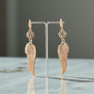 Gift Idea Collection Silver Angel Wing Earring Bohemian Dangle Design Floral Charm Accent Lightweight Statement Piece Wedding Guest Accessory Party Wear Essential Celestial Jewelry Trend Boho Style Fashion Special Occasion Must Have