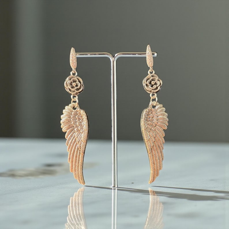 Gift Idea Collection Silver Angel Wing Earring Bohemian Dangle Design Floral Charm Accent Lightweight Statement Piece Wedding Guest Accessory Party Wear Essential Celestial Jewelry Trend Boho Style Fashion Special Occasion Must Have