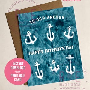 May include: A 10.8 cm by 14 cm A2 size greeting card with a teal watercolour background featuring six white anchor illustrations. The text reads TO OUR ANCHOR and HAPPY FATHER'S DAY in white block letters. A brown envelope is positioned behind the card.