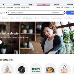 May include: Screenshot of the eBay website homepage. The page features a search bar, navigation links, and a promotional banner with the text "Returns made simple." Below are popular categories with product images.