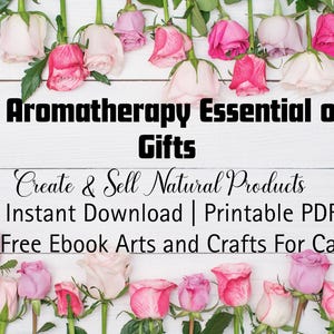 May include: Image featuring a white wooden background with pink, red, and white roses. Text overlay reads "101 Aromatherapy Essential Oil Gifts" and "Create & Sell Natural Products." Additional text includes "Instant Download | Printable PDF" and "Free Ebook Arts and Crafts For Cash."
