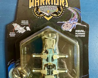HEXBUG Warriors Battling Robots Bionika Cyborg Academy Figure – New on Card, 2012 Tronikon Series, Yellow & Gray Robot Toy