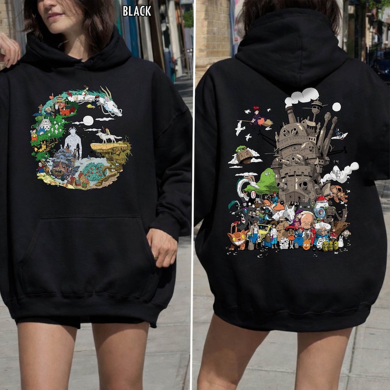 May include: Black hoodie featuring a front graphic of a dragon and characters in a circular design. The back displays a large graphic of a castle and animated characters. The word "BLACK" is printed at the top.