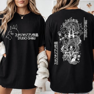 May include: Black t-shirt featuring a white graphic of a Studio Ghibli character on the front and a detailed illustration on the back. The text "スタジオジブリ作品 STUDIO GHIBLI" is printed on both sides.