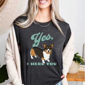 Tri Corgi Yes I Herd You shirt in dark grey heather color shirt on female model