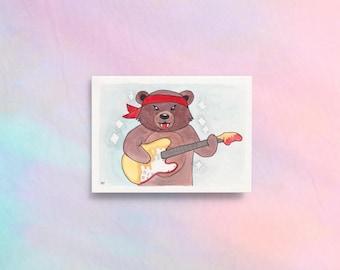 Rambo Bear Playing Guitar Card: Brown Cub Shredding a Pizza Axe Guitar Greeting