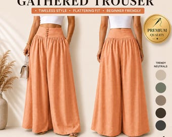 May include: Peach-colored wide-leg gathered trousers. The image shows the trousers on a model, with a high waist and button details. Text on the image reads "THE WIDE LEG GATHERED TROUSER" and "TIMELESS STYLE, FLATTERING FIT, BEGINNER FRIENDLY". The image also includes size information.