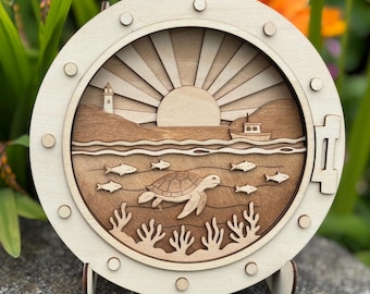 Scena z warstwami Ocean Sunset SVG – Podwodna scena rafy koralowej z żółwiem, łodzią, ramką iluminatora latarni morskiej wycinaną laserowo, DXF, PDF, Ai Natychmiastowe pobranie