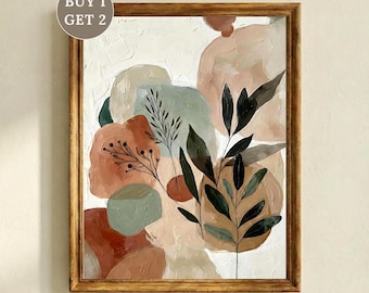 Può includere: Stampa artistica astratta in una cornice di legno. L'opera presenta forme organiche in tenui tonalità di pesca, verde e marrone, con elementi botanici verde scuro. Il testo "BUY 1 GET 2" è nell'angolo in alto a sinistra. Il fondo della cornice riporta il testo "EXA ART DESIGNS + BONUS GIFT NOTE CARD."