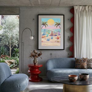 Tiny Ghosts Beach Day Wall Art shown as a large framed print on a modern concrete wall in an industrial living room with a blue curved sofa. The vibrant colors and quirky ghost theme act as a bold centerpiece, blending sophisticated architecture with whimsical coastal artistry. This mockup highlights how the print anchors a contemporary space with its unique story and impasto depth... — bring calm artistry to your walls.