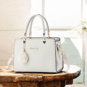 Bolso bandolera pequeño Xiaoyu para mujer: elegante bolso de mano con asa superior, bandolera y bolso de mano.