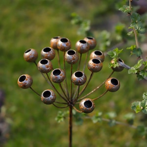 Rustic Metal Flower Garden Stake: Handmade Exotic Bloom.