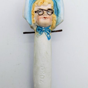 A antique bisque hand painted Victorian porcelain figure 'Nodder' head