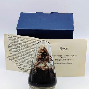 An unusual Caithness glass paperweight 'Nova' by Colin terris 1981 unlimited