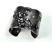 Rubber Cut Out Cuff