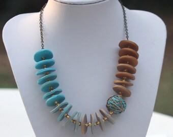 Gradual colored necklace in gold, beige and turquoise, polymer clay