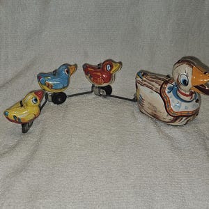 1950s TPS Tin Wind Up Duck Family