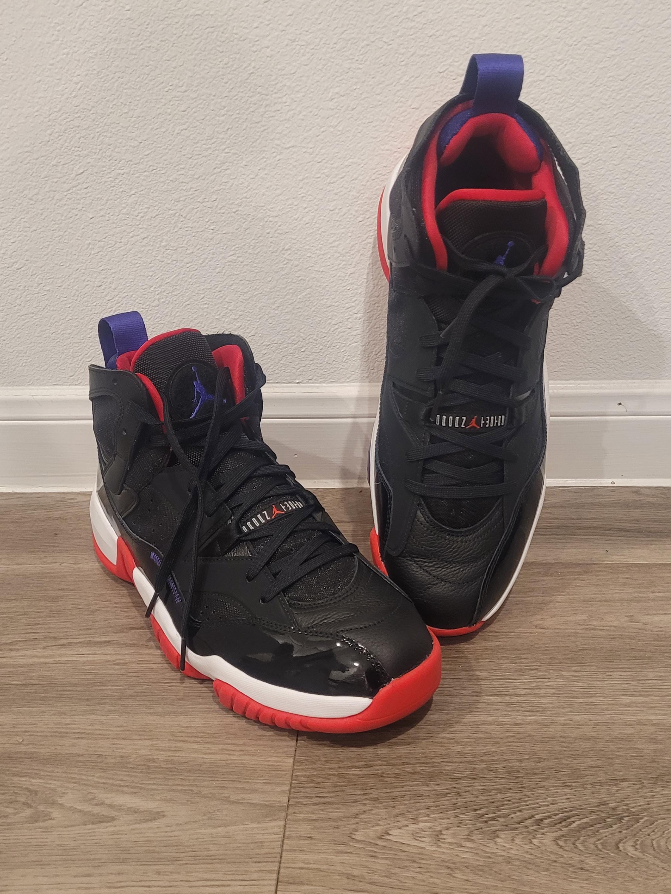 jordan 13 all black red bottom