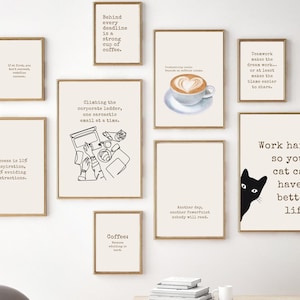 May include: A set of framed art prints with various quotes and humorous statements. The prints include phrases such as "Work hard so your cat can have a better life" and "Behind every deadline is a strong cup of coffee."