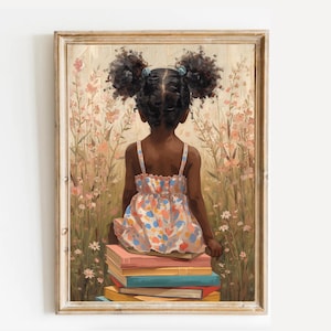 May include: A framed painting depicts a young girl with dark hair in pigtails, wearing a colorful dress, seated atop a stack of books. The background features a field of wildflowers in soft hues, creating a serene and whimsical scene.