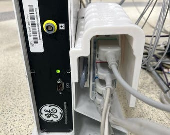 Plate cover for GE Tram