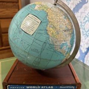 Vintage 1960&#39;s-1970&#39;s Rand McNally World Globe on a Wooden base with a popular World Atlas Included
