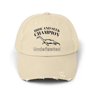 Hide and Seek Champion Undefeated Hat  Funny Distressed Loch Ness Monster Cap