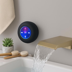 Altavoz Bluetooth con luces LED: portátil, resistente al agua y apto para montar en la pared, ideal para el baño o el exterior.