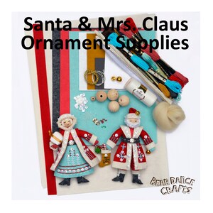 May include: A felt craft kit to make Santa and Mrs. Claus ornaments. The kit includes felt pieces in red, white, blue, and green, along with beads, embroidery floss, and wooden beads. The kit also includes a piece of white felt for the background.