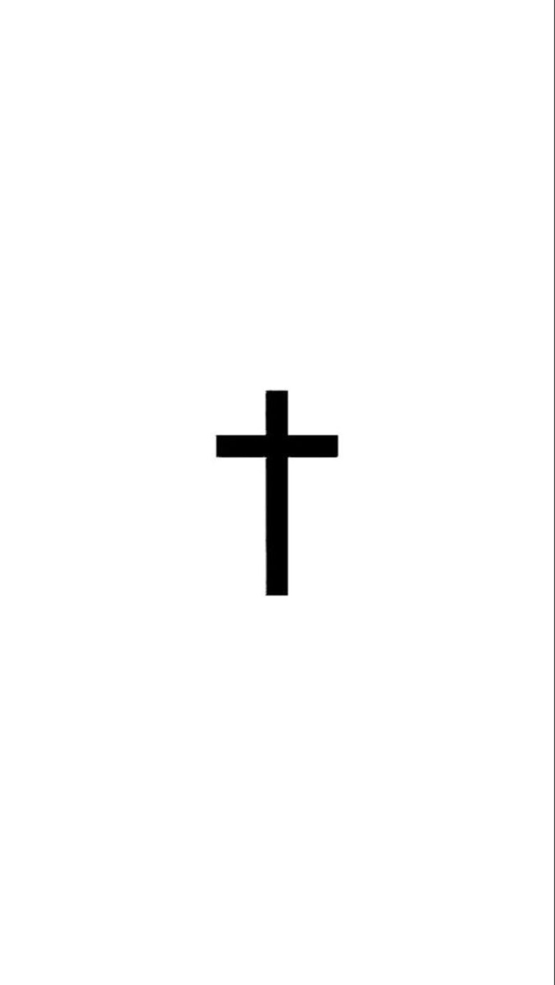May include: A black cross with a simple design.