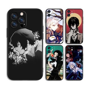 May include: A collection of black phone cases featuring anime character illustrations. The cases showcase various characters in detailed, colorful designs. One case has a black and white portrait, while others display full-color anime scenes.