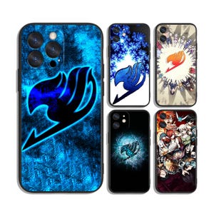 May include: Five smartphone cases featuring Fairy Tail anime designs. One case has a large blue glowing emblem on a textured blue background. Others display fractal patterns, a central orange emblem surrounded by characters, or character collages.