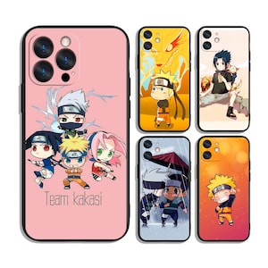 May include: Pink phone case featuring a cartoon illustration of the "Team Kakashi" characters. Additional phone cases with various anime character designs are also shown. The cases have black borders and are designed for smartphones.