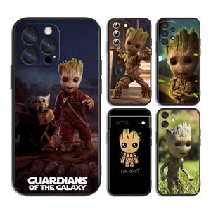 May include: A collection of five black smartphone cases featuring various depictions of the character Groot. One case displays Groot and Grogu with the text Guardians of the Galaxy, while others show Groot in different poses, including a cartoon version with the text I Am Groot.