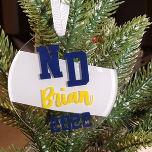 University of Notre Dame/Fighting Irish Ornament/comes with a sticker