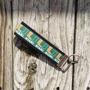 University of Miami/ Hurricanes/keychain/key fob/Comes with a Miami sticker