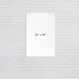 Puede incluir: Una impresi&oacute;n en lienzo blanco con las dimensiones 20" x 30" impresas en ella.