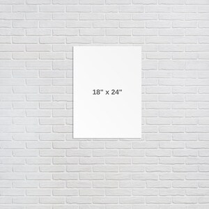May include: A white canvas print with the dimensions 18" x 24" printed on it.