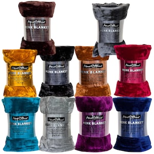 May include: Ten different colours of soft mink blankets, each rolled up and displayed with a label that reads "About Home Mink Blanket".
