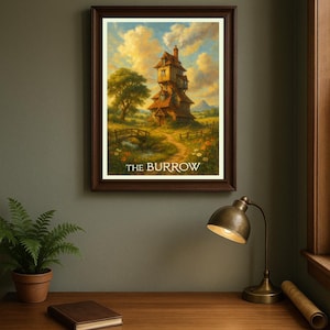 May include: A framed art print depicting a whimsical, multi-story house with a chimney, set against a backdrop of a blue sky with clouds. The text "THE BURROW" is at the bottom. The print is displayed on a wooden desk with a lamp and a potted plant.