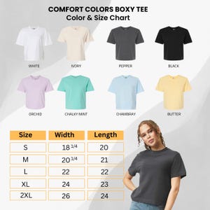 May include: A color and size chart for Comfort Colors Boxy Tees. The chart displays t-shirts in various colors: white, ivory, pepper, black, orchid, chalky mint, chambray, and butter. The size chart includes measurements in inches for width and length, ranging from size small to 2XL.