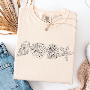 Camiseta de conchas marinas de los 90 con estilo vintage de Comfort Colors®, camiseta retro Y2K con conchas marinas, camiseta para amantes del mar, camisetas de verano con océano, camiseta con animales marinos adorables