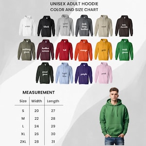 Op de afbeelding: Een kleurenkaart voor unisex hoodies voor volwassenen, met kleuren als wit, zwart en rood. De kaart bevat een maattabel met maten van S tot 2XL, met breedtes van 50.8 tot 71.1 cm en lengtes van 68.6 tot 78.7 cm.