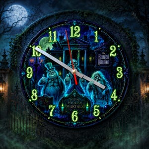 May include: A round wall clock featuring The Haunted Mansion theme with glowing green numbers and hands. The clock face displays a dark mansion, three ghostly figures, and a sign that reads Welcome Foolish Mortals in a spooky, moonlit setting.