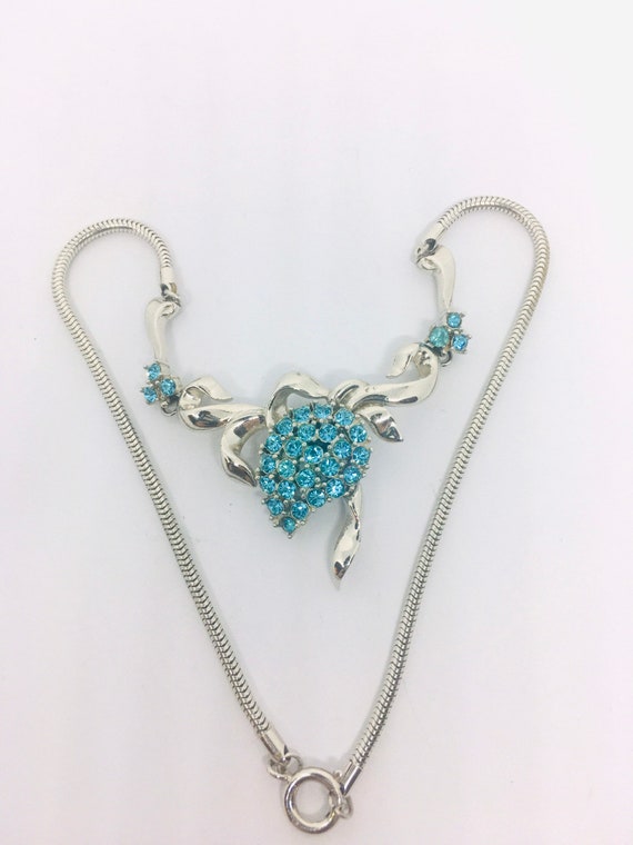 Aquamarine Rhinestone Necklace Rhodium Ribbon Flor