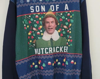 El Elfo - Hijo de un Cascanueces Suéter Navideño