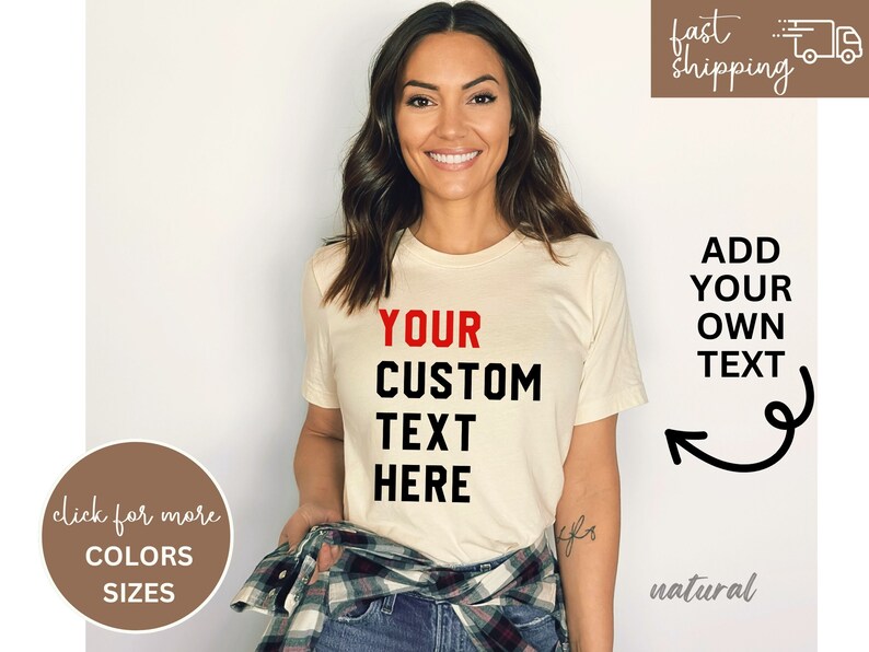 May include: A white t-shirt with black text that says "YOUR CUSTOM TEXT HERE". The text "YOUR" is in red. The shirt is being modeled by a person.